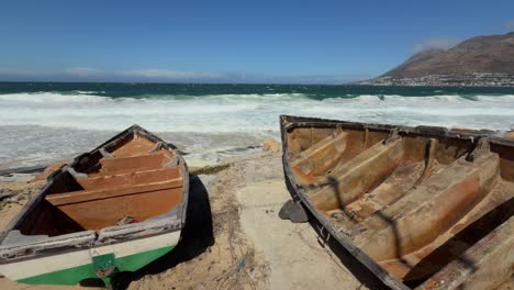 fishing boats moored on beach