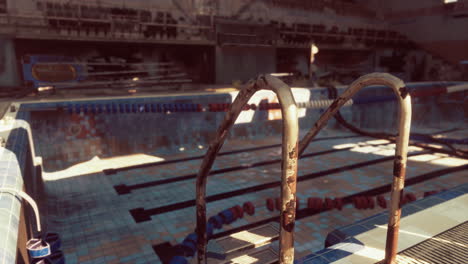 abandoned swimming pool in ruins