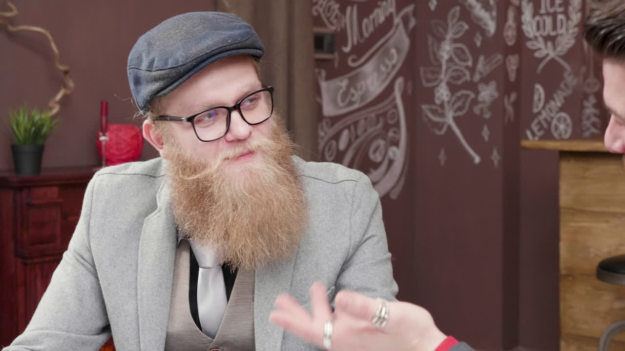 Men in suits in coffeehouse