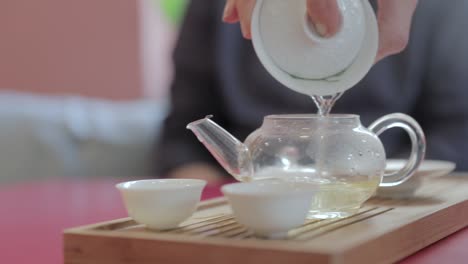 this chinese specialty tea is poured into a personal teapot in a cafe in holland