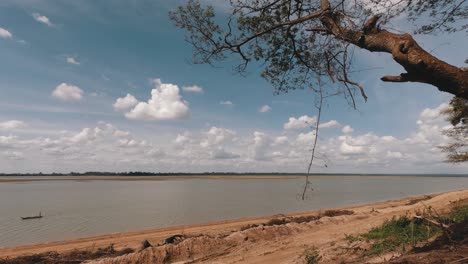 Timelapse-of-Lake-with-Blue-Sky-and-Fluffy-White-Clouds