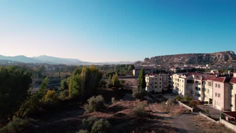 playground and modern hotel in urgup, cappadocia, turkey, drone ascending