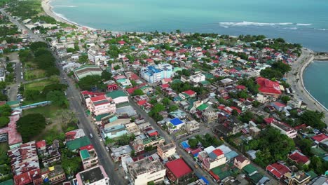 aerial view of coastal downtown and street roads in virac, catanduanes, philippines