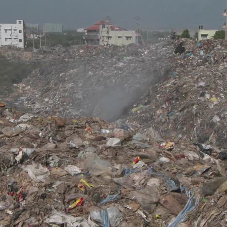 Smoke-rises-from-burning-rubbish-in-a-large-urban-landfill