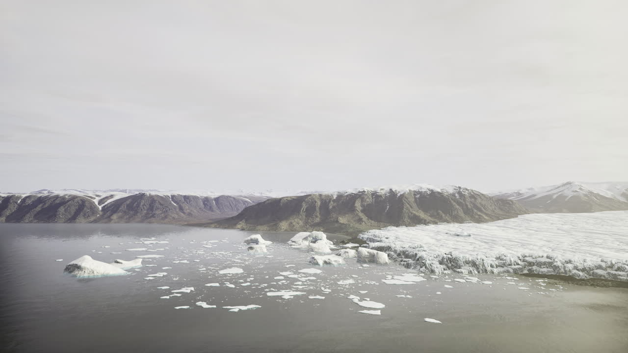 Glacial landscape with melting icebergs near mountain range in daylight