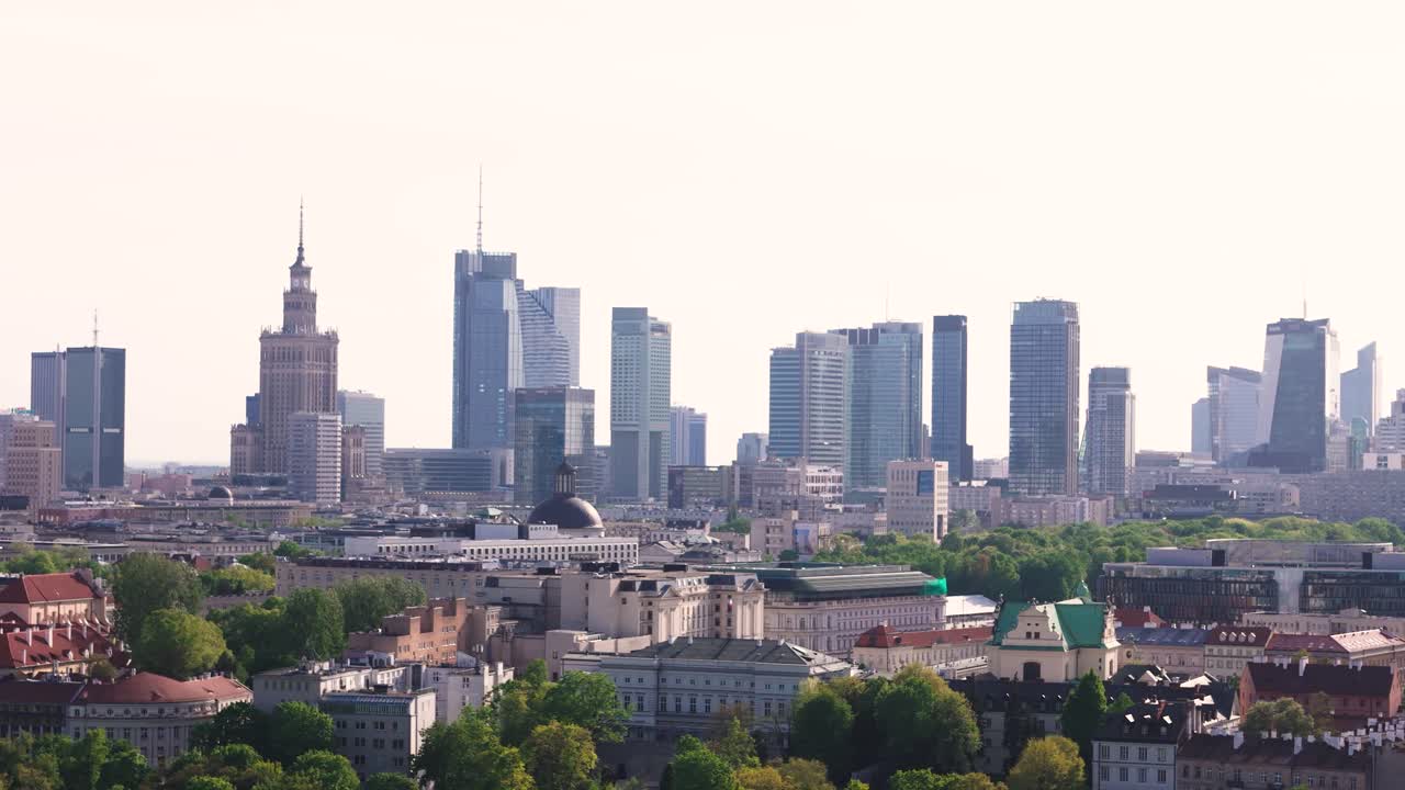 Warsaw cityscape with greenery in foreground, Poland