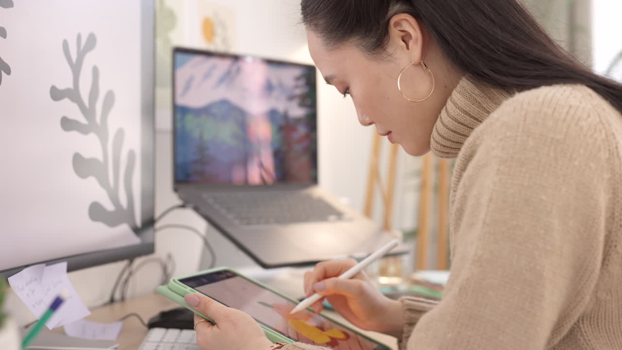 Asian woman, graphic designer and tablet