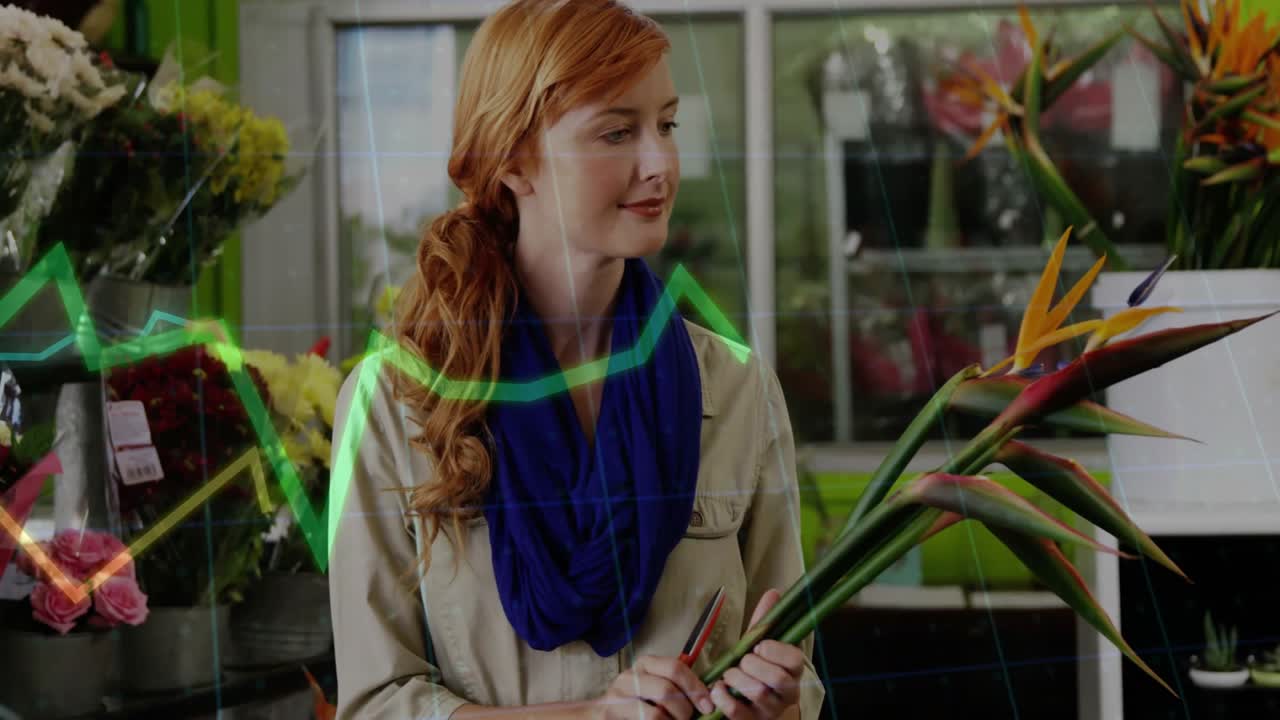Upon noticing damaged leaf, florist snipping stem in florist shop, animated graphs tracking quality