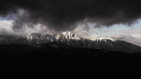 wide angle aerial drone shot of beautiful mountains in predeal romania