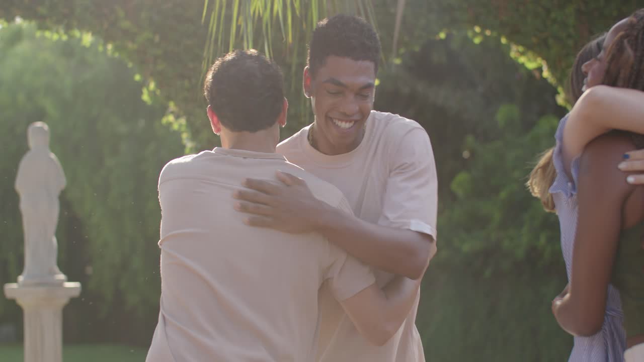 Young friends enjoying a social gathering outdoors