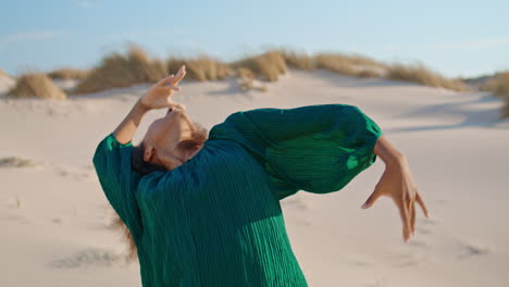 girl performer dancing desert at summer close up. woman moving body sensually.