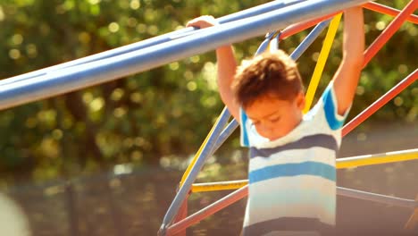 Schoolboy-playing-on-monkey-rack