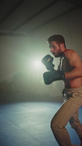man training at the boxing gym