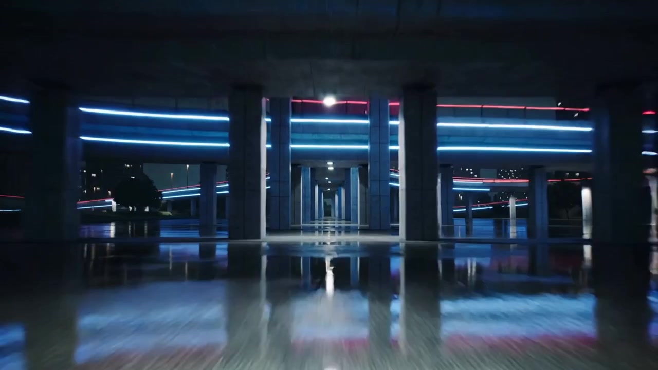 La telecamera avanza e si abbassa, rivelando colonne di cemento sotto un cavalcavia, mostrando specchi al neon.