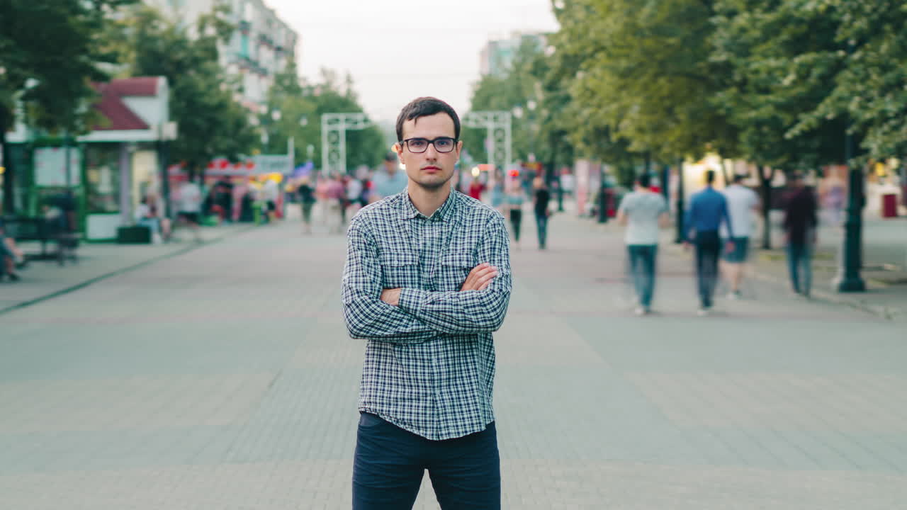 Man standing on a city street