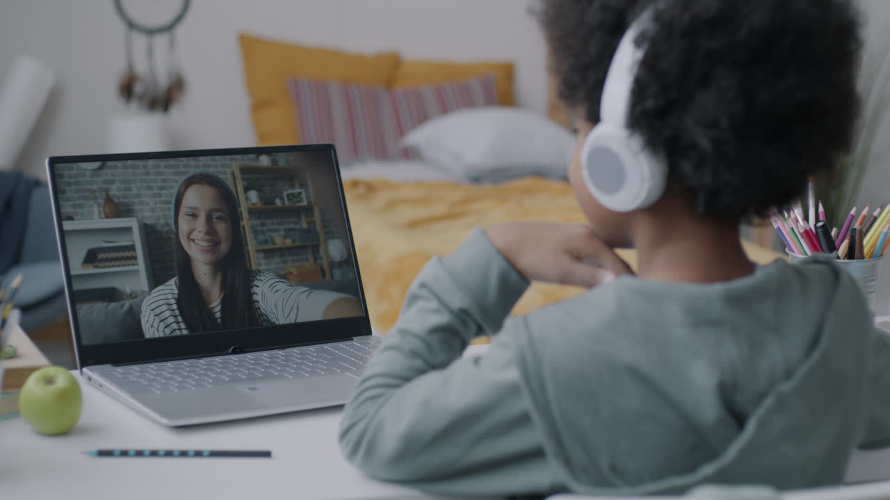 Student having a video call with a friend/family member