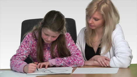 Mother-heling-her-child-with-homework