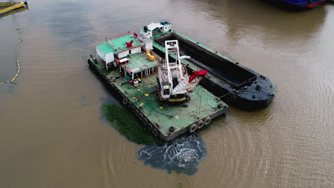 dredging the river on a sunny afternoon, it is a favorable reality