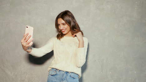 happy woman taking a selfie