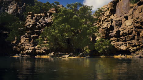 serene reflections shimmer on tranquil waters surrounded by rugged cliffs