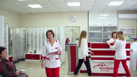 medical healthcare service. doctor invites patient to enter medical office