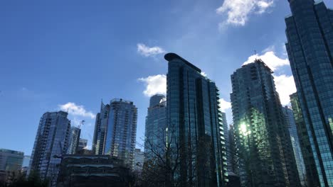 Multiple-skyscrapers-of-glass-at-downtown-Vancouver-on-a-bright-sunny-winter-day