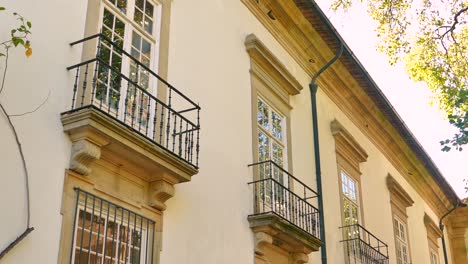 casa do passadico building windows with balcony in braga, portugal