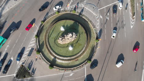 Plaza-de-Cibeles,-Cibeles-square-in-Madrid-on-a-Christmas-afternoon-shoot-at-4k-24fps-from-above