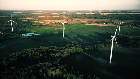 Aerial-view-of-windmills-farm-for-energy-production-on-beautiful-cloudy-sky-at-highland