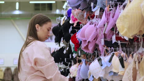 woman browsing lingerie in a store