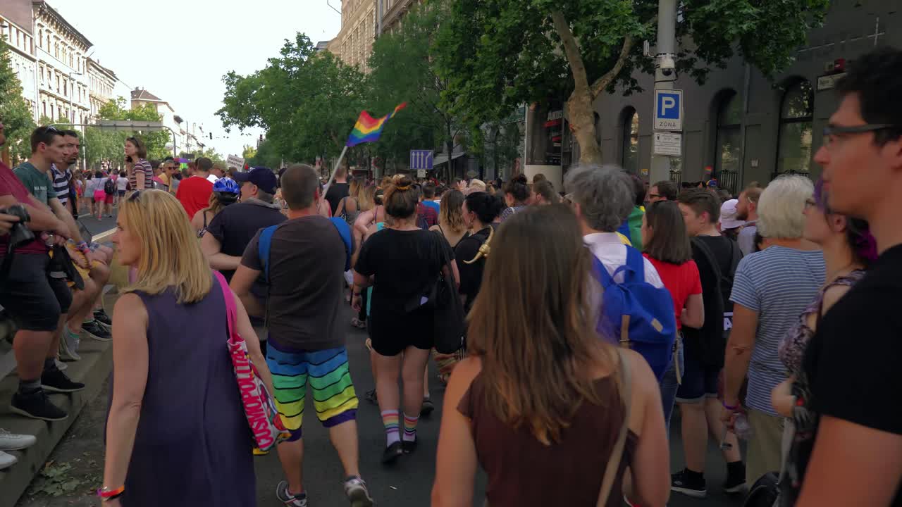 Colorful people marching in the Budapest Pride,