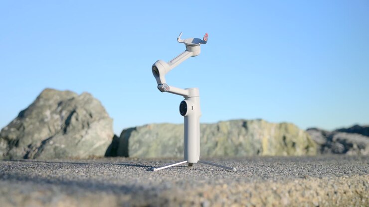 Smartphone Gimbal Stabilizer with Tripod Outdoors on a Sunny Day