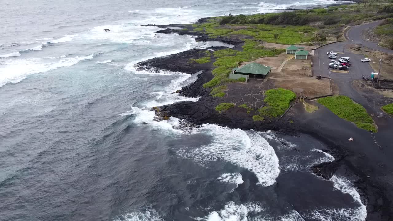 Aerial View of a Black Sand Beach in Hawaii