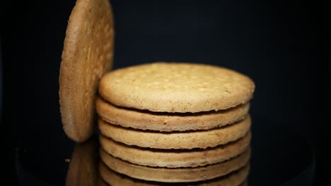 Stack-Of-Digestive-Biscuits-Isolated-On-Black-Background