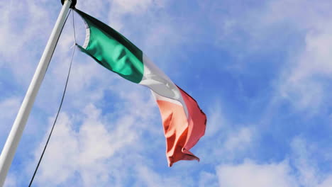 national flag of ireland in the wind