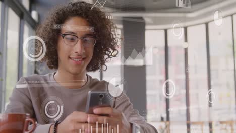 Animation-of-round-scanner-against-biracial-man-smiling-while-using-a-smartphone-at-office