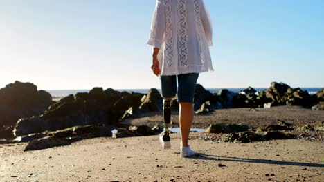 disabled woman walking in the beach 4k