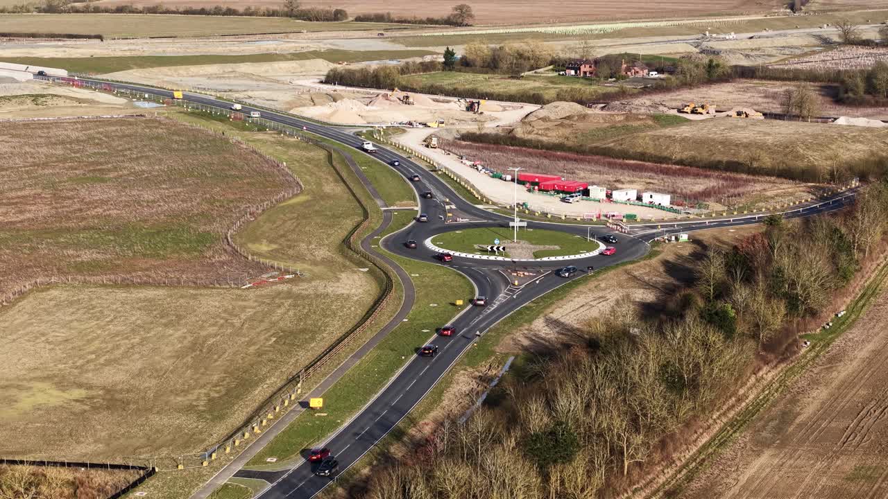 Aerial view of modern traffic infrastructure blending into English countryside at Waddesdon A41 roundabout