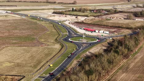 Aerial view of modern traffic infrastructure blending into English countryside at Waddesdon A41 roundabout