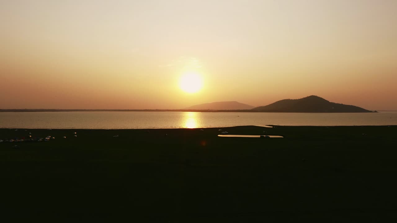 Aerial shot of Landscape at the end of Pa Sak Jolasid Dam on sunset