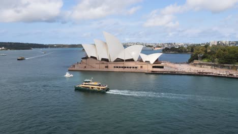 ferryboat traffic around sydney opera house, sydney, australia.