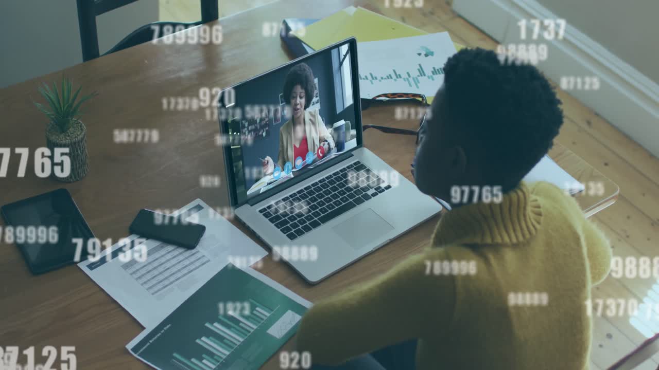 Multiple changing numbers falling against woman having a video call on laptop at home