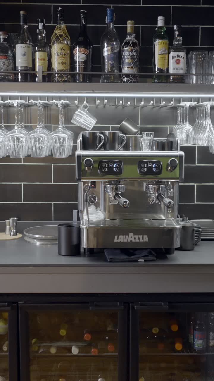 Bar Setup with Lavazza Espresso Machine and Liquor Bottles