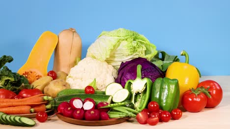 assorted vegetables arranged on a white background