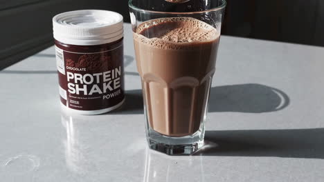preparing a chocolate protein shake