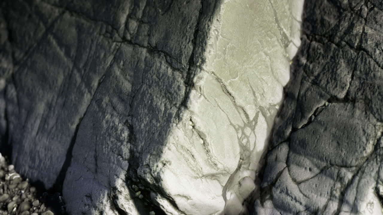 Natural rock formation showcasing intricate textures and light patterns