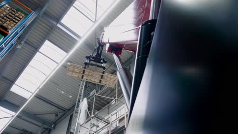 extending crane in storage, low angle