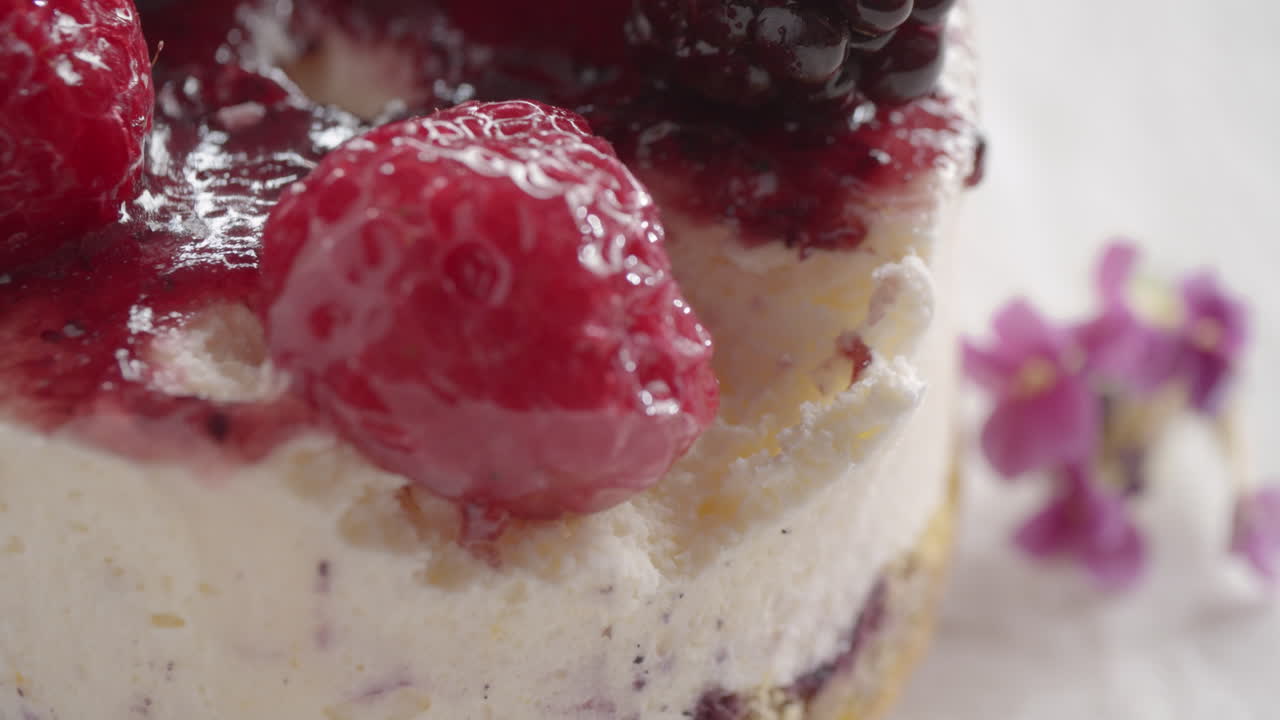 Eating delicious restaurant dessert with glazed berries