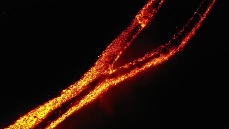 cinematic nighttime lava or magma drone shot, active volcano mount etna sicily italy