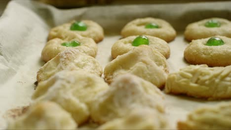 baked goods lined up in a row on a cookie sheet